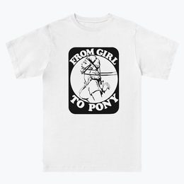 Illustration of girl with fetish gear around her face with the words "From girl to pony" around it. In black, on a white T-shirt from the UK Fetish Archive Merch.