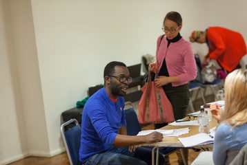 A writing student engaging with the group.