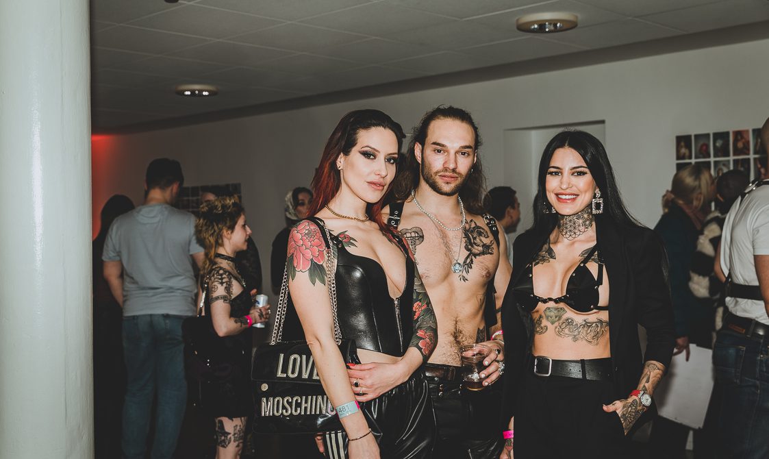 Image of three visitors on the Kink in the Archive event.