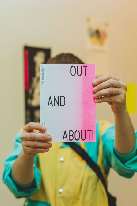 This gallery of photographs shows images of the people who attended the Out and About! exhibition at Barbican. The pictures consist of various people standing together, talking, listening and looking at items in the exhibition.