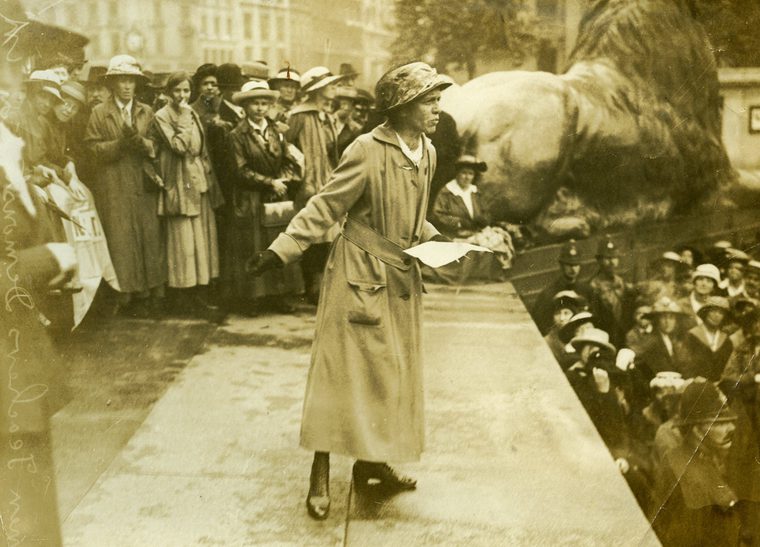 Black and white image of Agnes Dawson speaking to the crowd at a rally in Trafalgar Square, c.1924