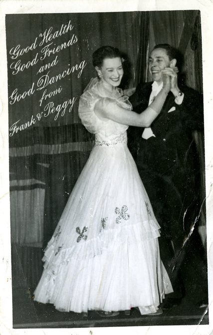 A picture of Peggy Spencer dancing with her husband Frank. Written on the photo it says: "Good health, good friends, and good dancing, from Frank and Peggy".