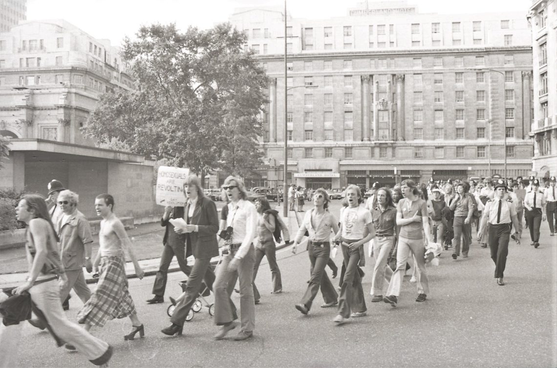 A picture from the second Pride march in 1973. A group of people are marching down from Embankment to Hyde Park.