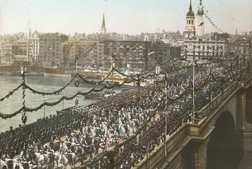 Tinted image of the Diamond Jubilee procession crossing London Bridge in 1897