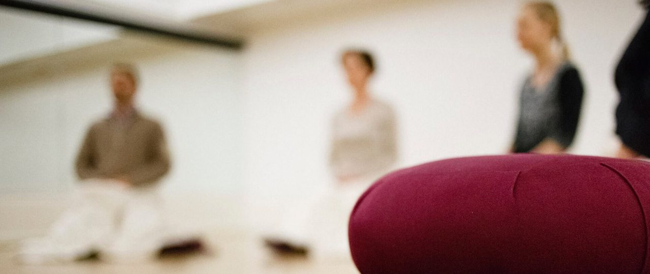 a group taking a Meditation class at Bishopsgate Institute, London