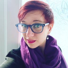 A portrait photo of tutor Emily Garside.